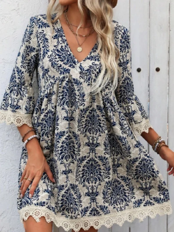 Blue Zone Planet |  Lace Detail Printed V-Neck Mini Dress Fashionable Mini Dress with Pockets