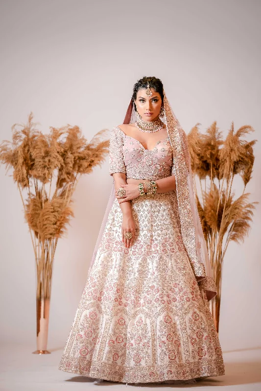 Ivory silk Lehenga with embroidered Corset Blouse Balloon Sleeve Blouse